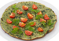 Omelette soufflée aux légumes verts tomates confites et basilic