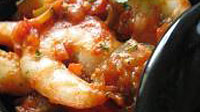 Cassolette de scampis tomatée à la coriandre
